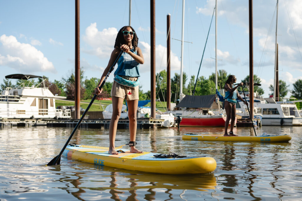 Learn how to paddle in the protected area of the strand
